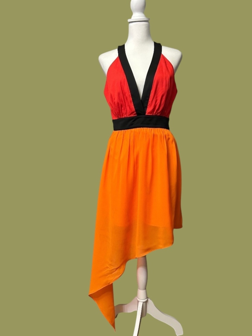 11.	Bebe Color Block Sundress with Asymmetrical Hemline
